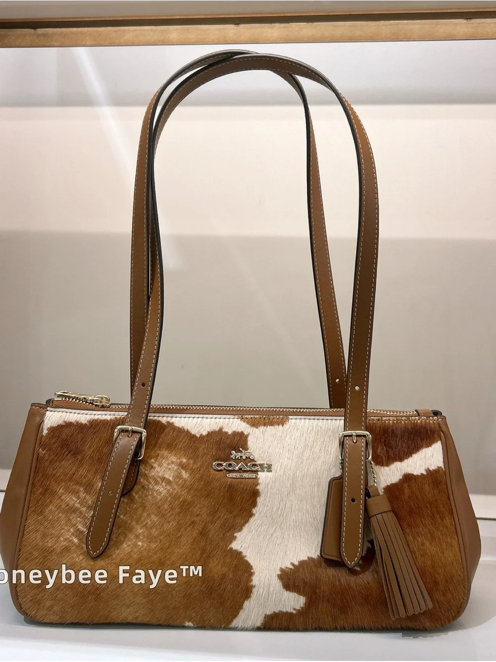 Coach Asher cow print Tan and White Cowhide Shoulder Bag with Tassel